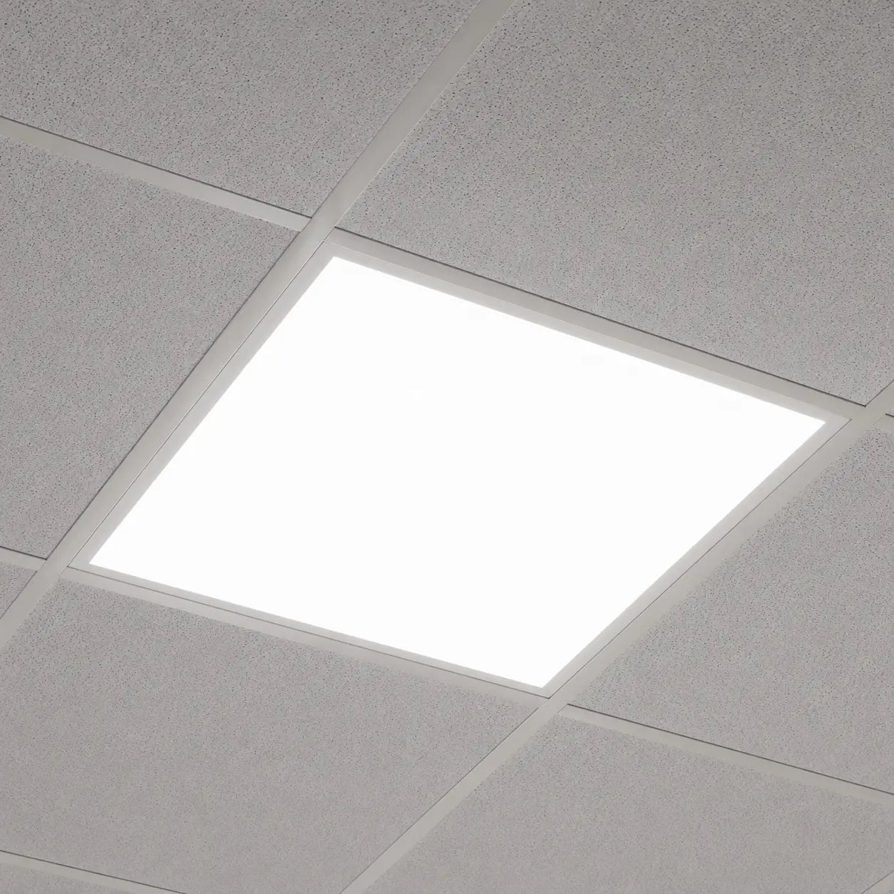 2x2 LED panel Square ceiling light fixture embedded in a gray tiled ceiling