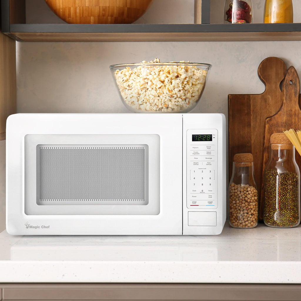 Magic Chef 0.7 Cu. Ft Countertop Microwave | 700 Watt | White Color | Digital Display | 6 Auto Cooking Modes | Child Lock | Auto Defrost Modes | 10 Power Levels image 1